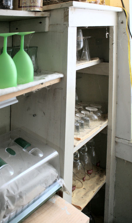 Glass cabinet holds glassware