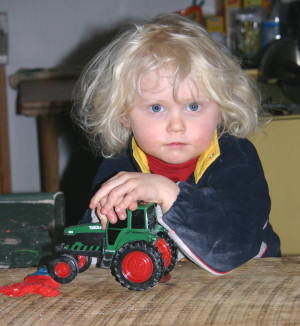 Child with Tractor - Portrait