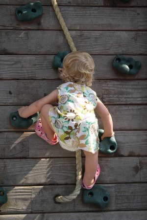 Child on Climbing Wall - Portrait