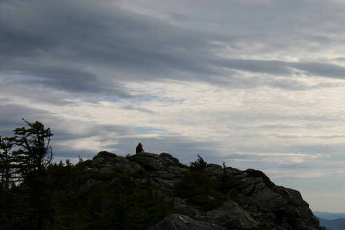 Stevie stands on the summit of Mt. Mansfield